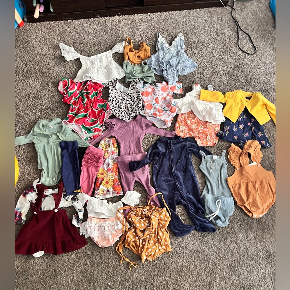 Baby girl clothing. Ranges from 0-3, 3-6, and 6-9. There is about 27 pieces.